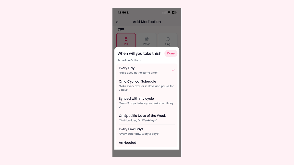 A Femora medication schedule screen showing the 'Synced with my cycle' option, on a soft blush background